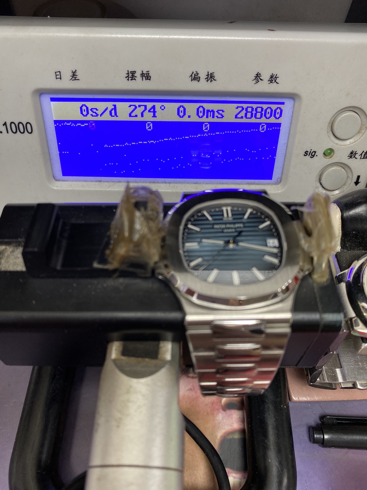 Patek Philippe Nautilus series 57111A 010, Stainless Steel Case Grey-Blue Dial Stainless Steel Bracelet, 40mm Size.