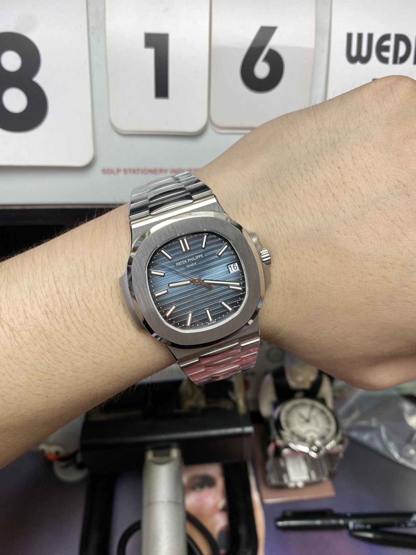 Patek Philippe Nautilus series 57111A 010, Stainless Steel Case Grey-Blue Dial Stainless Steel Bracelet, 40mm Size.