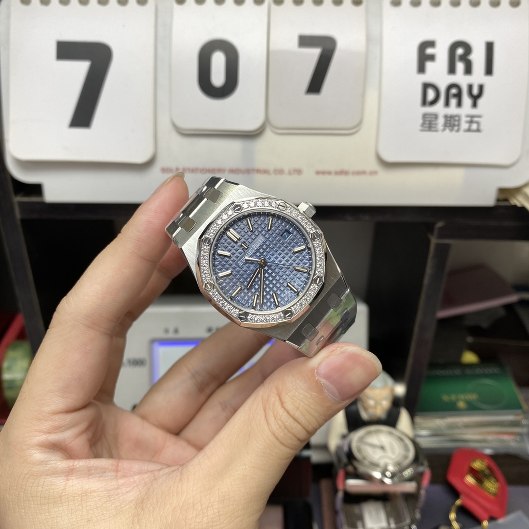 Audemars Piguet Royal Oak Offshore Series 77451ST.ZZ.1361ST.04, Blue Dial Gem-Set Bezel Mechanical Movement, 34mm Size.