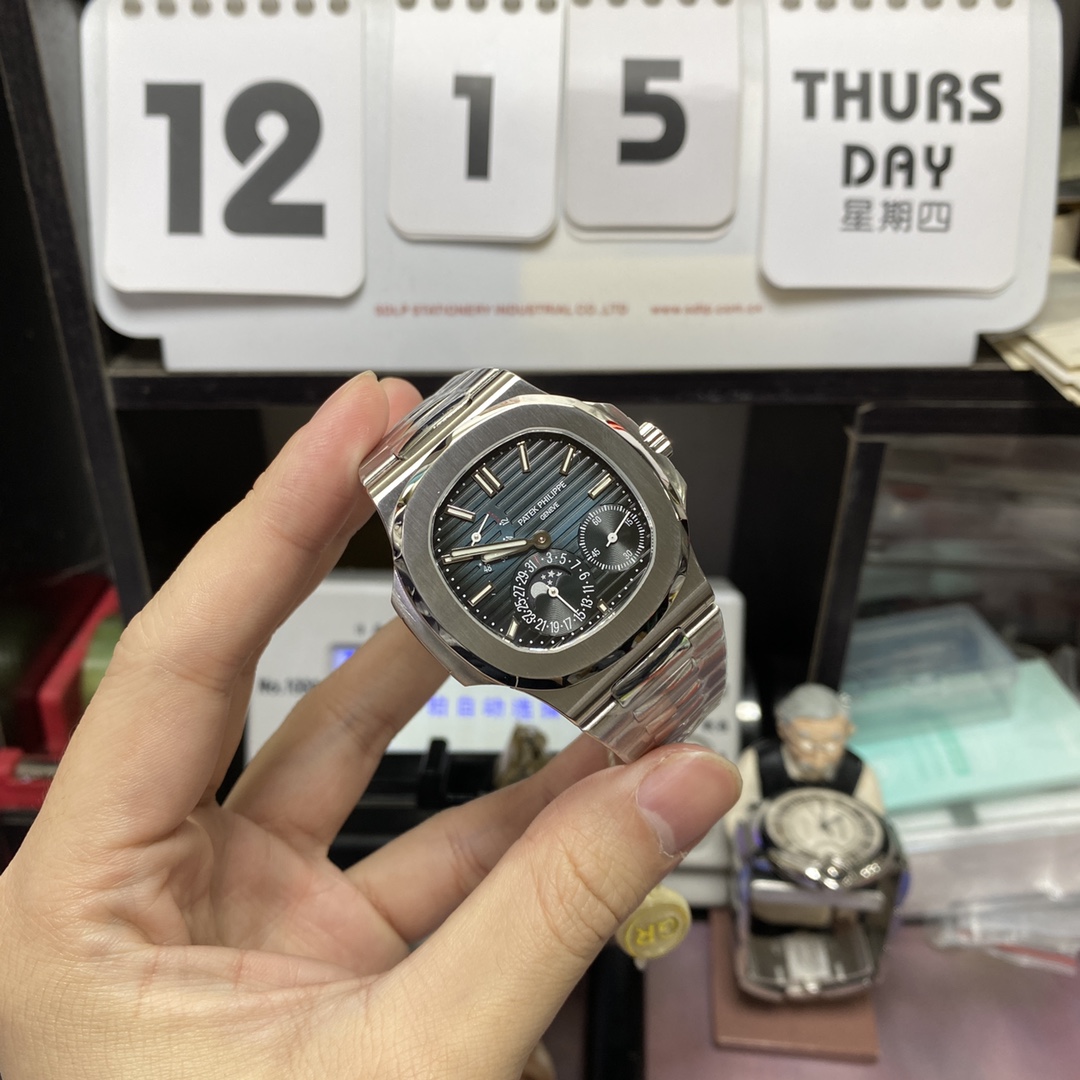 Patek Philippe Nautilus series 57121A-001, Blue Dial Steel Bracelet, Synchronized Functions, 40mm size.