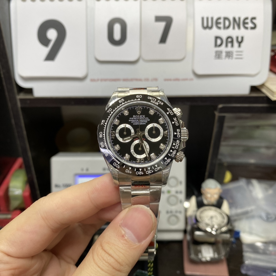 Rolex Cosmograph Daytona Series m116509-0055, Black Ceramic Bezel Stainless Steel Bracelet Square Diamond Hour Markers, 40mm size.