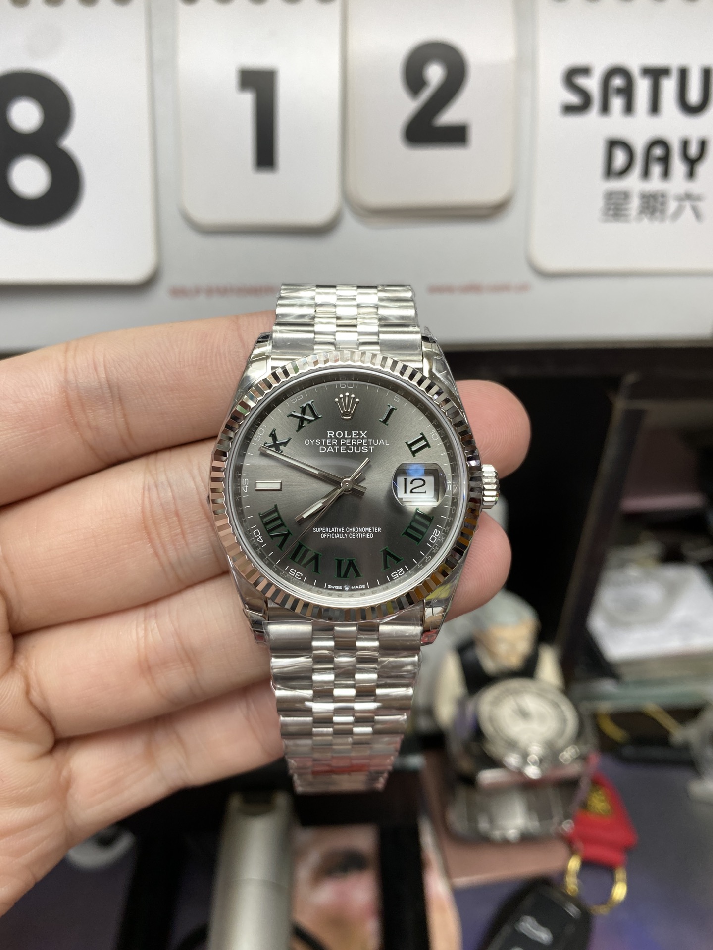 Rolex Datejust series m126234-0045, Green Roman Numerals on a Green Dial, 36mm size.