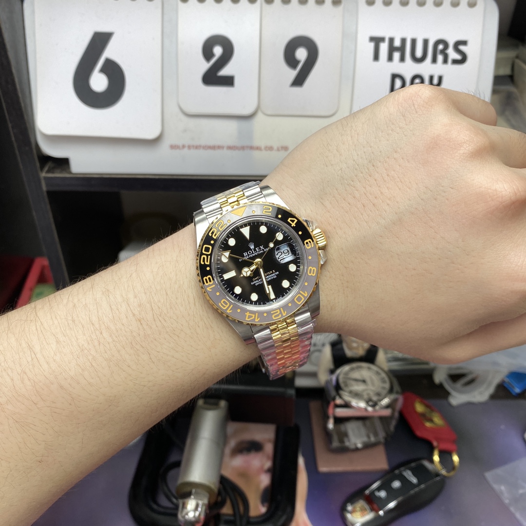 Rolex GMT-Master II series m126713grnr-0001, InterGold Black/Grey Ceramic Bezel InterGold Five-Bead Chain Steel Bracelet, 40mm size.