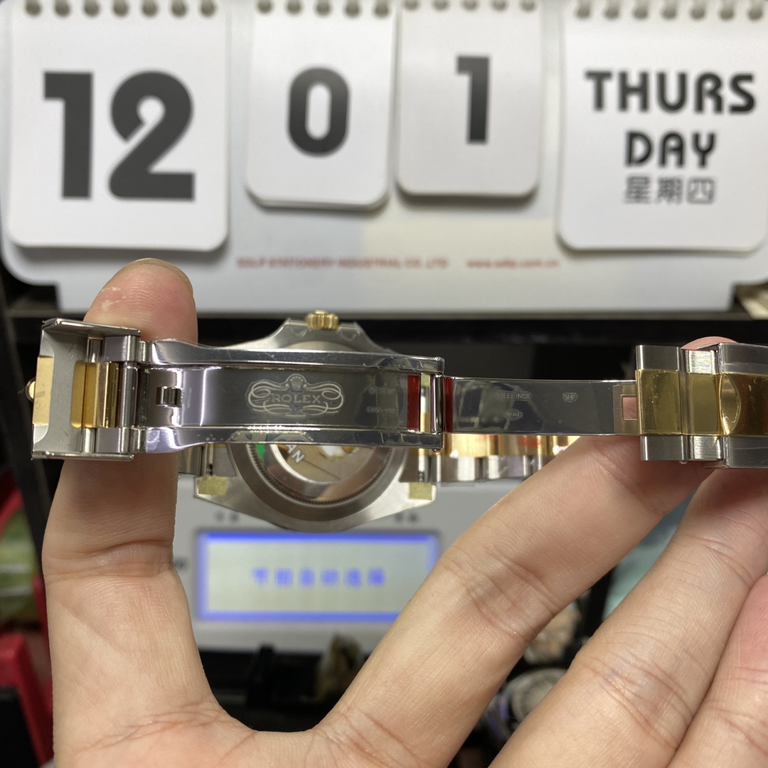 Rolex Submariner Series 116613LN-0001, Two-Tone Black Submariner, 40mm size.